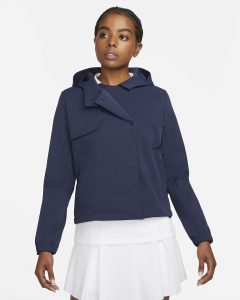 Barn regnkläder för golf-banan